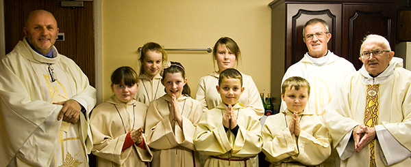 The Sanctuary Party prepare for to celebrate the First Mass of Christmas